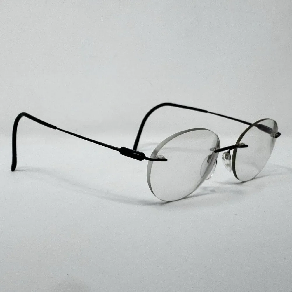 Silhouette 5561 70 9040 86D Rimless Eyeglass Frames Black 19-150 Austria